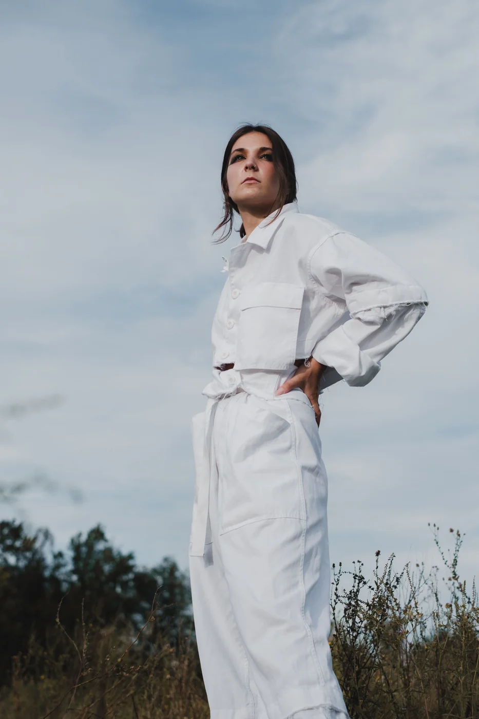 Fashion portrait in white outdoors